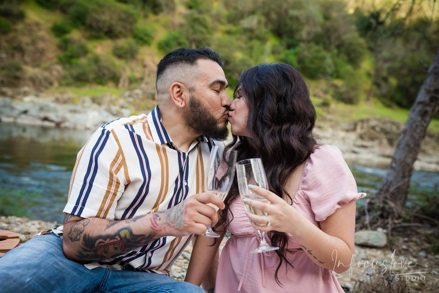 A close embrace by the river