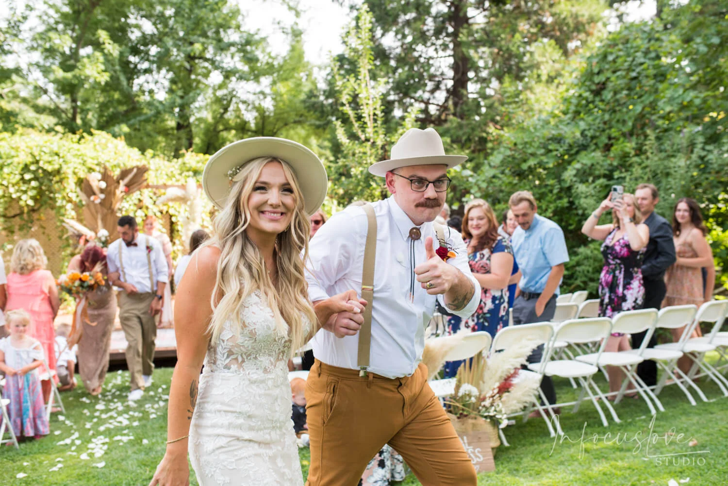 A wedding couple walking joyfully together