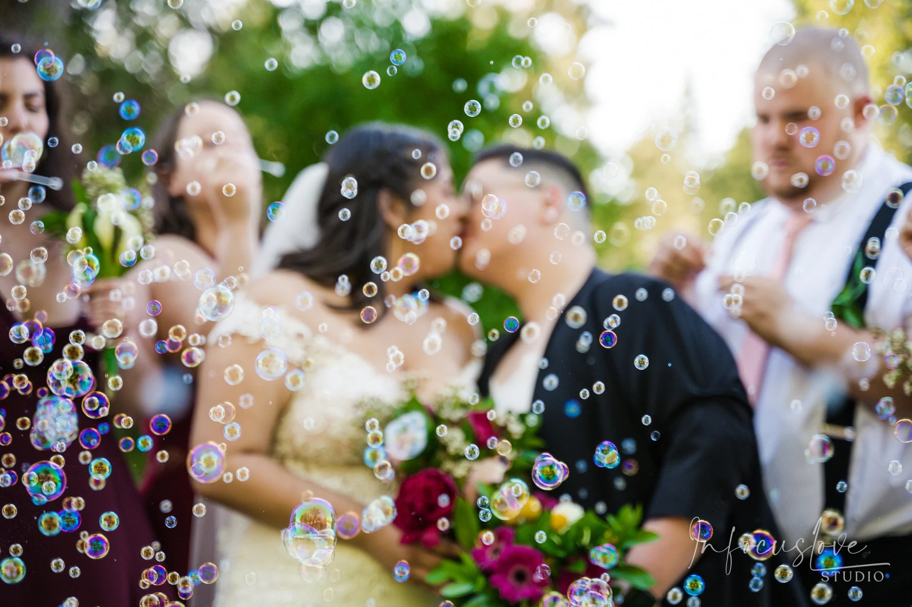 Wedding guests celebrating with bubbles